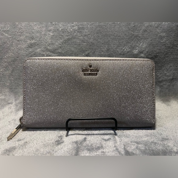 kate spade Handbags - Kate Spade Joeley Large Silver Glitter Continental Wallet